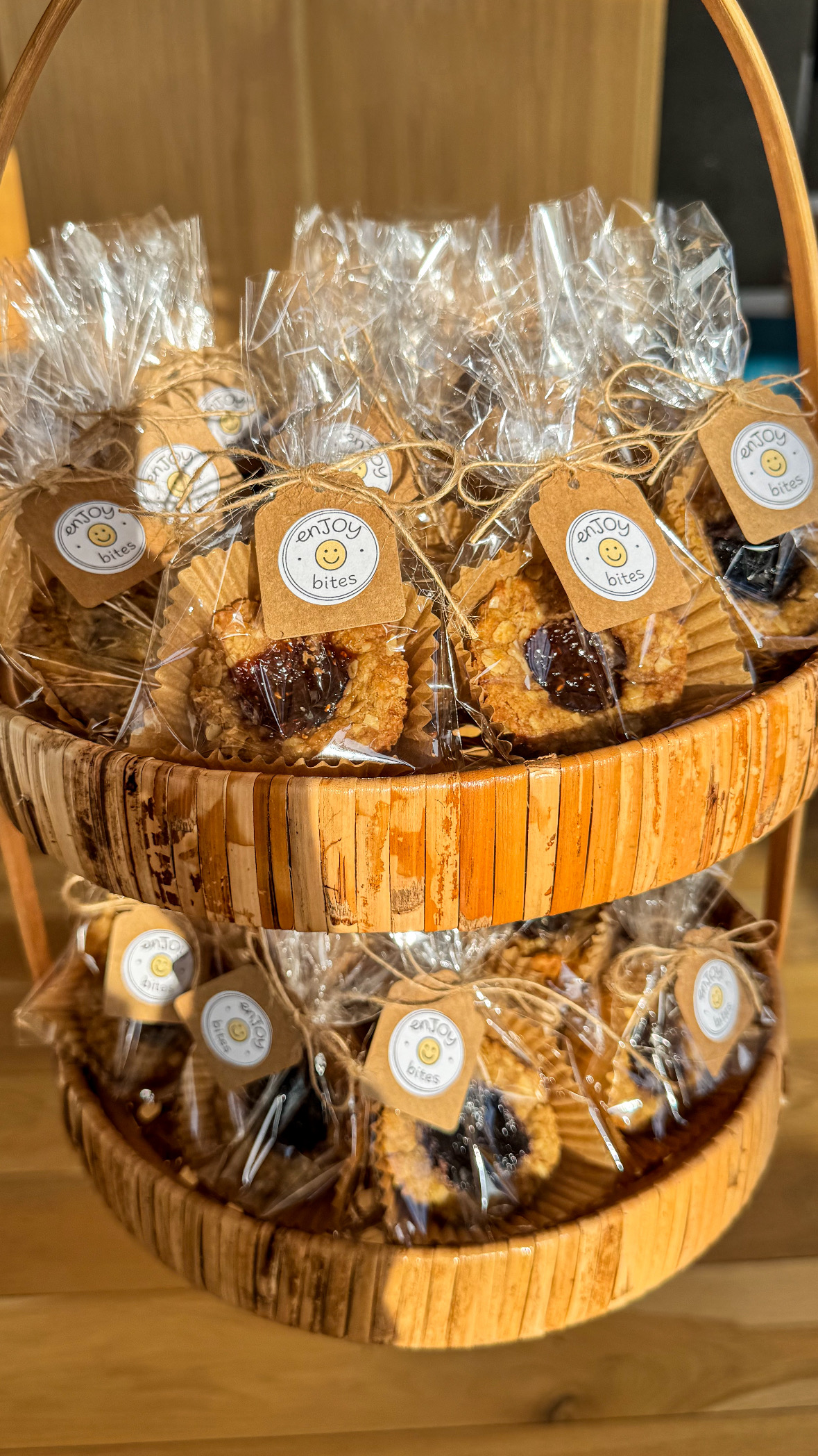 Individually wrapped enJOY bites oatmeal tarts displayed in a basket